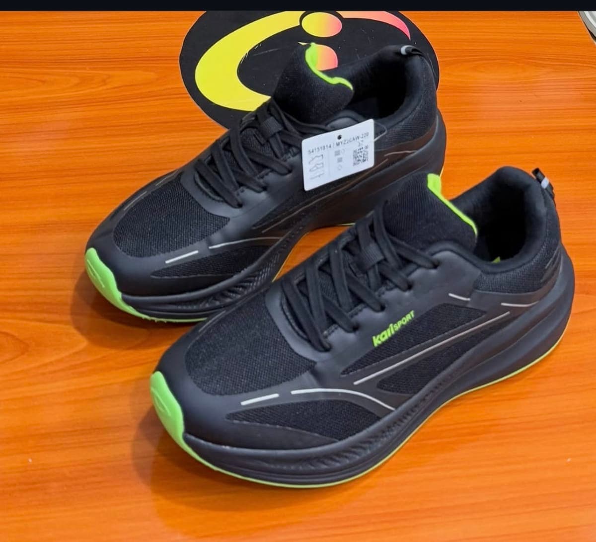 Karlsport Design/Style: Low-top lace-up athletic sneakers featuring a black mesh and synthetic upper, cushioned for boys and girl